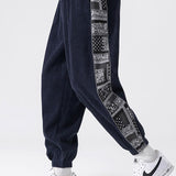 Velira Pants tamsiai mėlyna / S Šviesos džinsinio audinio paisley rašto kelnės